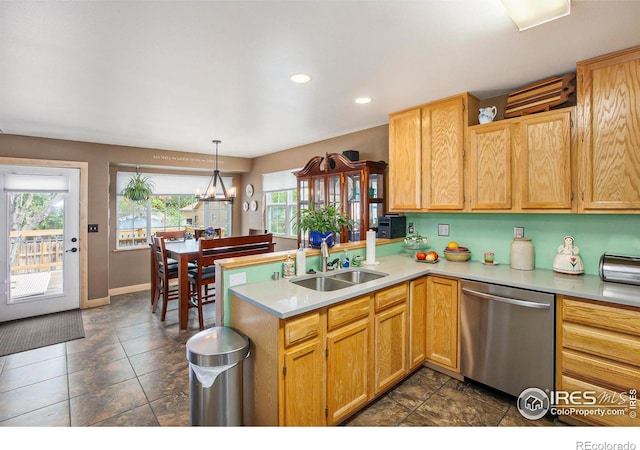 5049 W 2nd Street Rd, Greeley, CO 80634 - kitchen with dishwasher, a sink, a peninsula, light countertops, and recessed lighting
