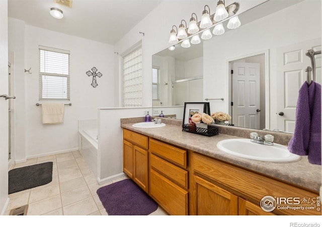 bathroom featuring a shower stall, tile patterned floors, double vanity, a bath, and baseboards