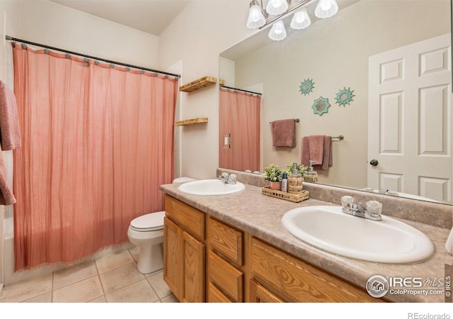 bathroom featuring tile patterned floors, toilet, double vanity, and a shower with curtain