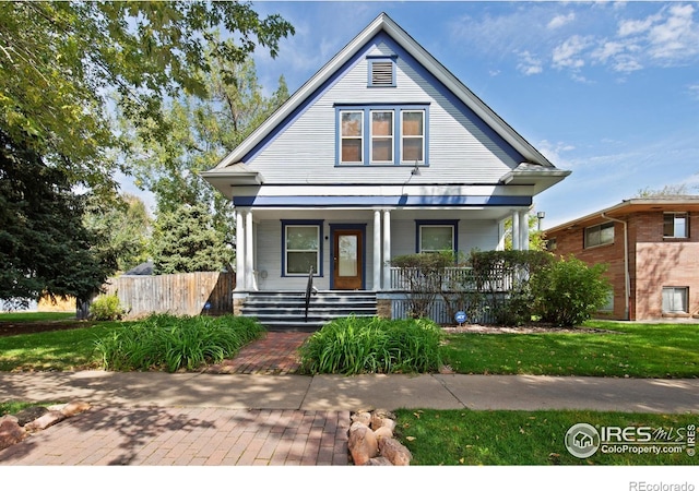 view of front of property featuring covered porch