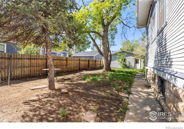 view of yard with fence
