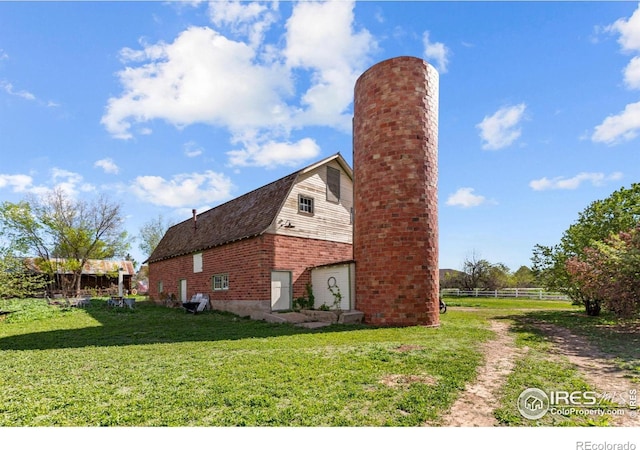 1341 N 95th St, Lafayette, CO 80026 - view of property exterior featuring a gambrel roof