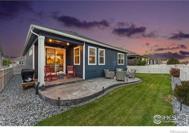 rear view of house featuring a patio and an outdoor hangout area
