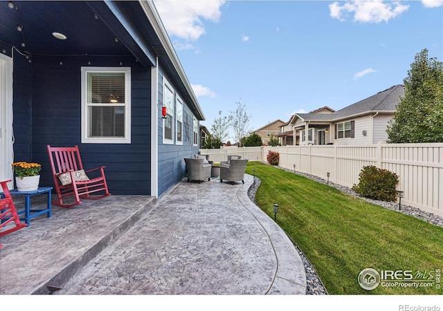 view of yard featuring a patio and an outdoor living space