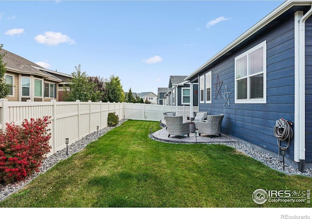 view of yard with a patio and outdoor lounge area