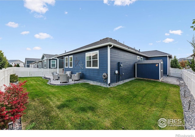 back of house featuring a patio and an outdoor hangout area