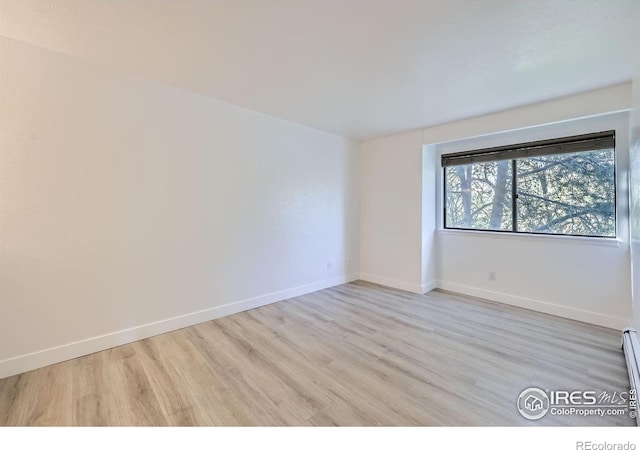 3363 Oneal Pkwy Unit 36, Boulder, CO 80301 - unfurnished room featuring light wood-type flooring and baseboards