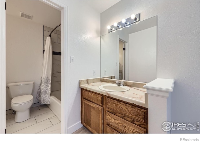 3363 Oneal Pkwy Unit 36, Boulder, CO 80301 - bathroom with toilet, vanity, shower / tub combo with curtain, and tile patterned floors