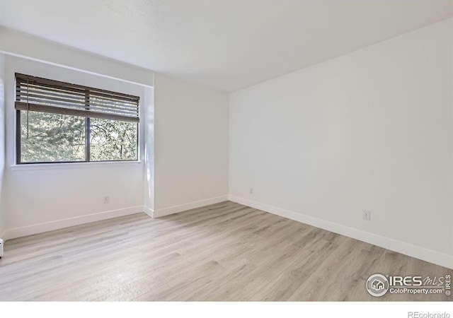 3363 Oneal Pkwy Unit 36, Boulder, CO 80301 - empty room with light wood-style floors and baseboards