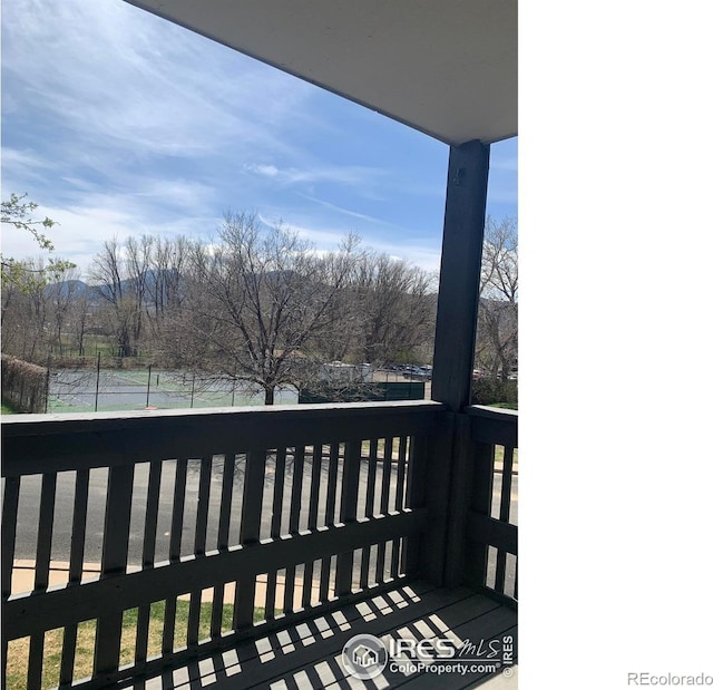 3363 Oneal Pkwy Unit 36, Boulder, CO 80301 - wooden terrace with view of scattered trees