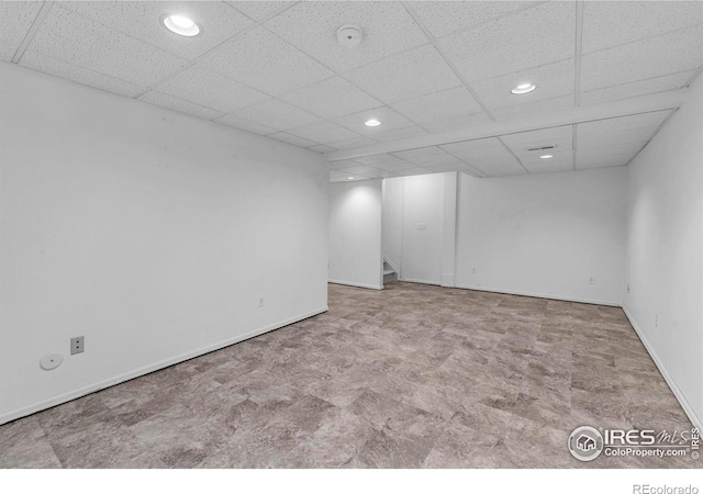 1606 Iris St, Broomfield, CO 80020 - unfurnished room featuring recessed lighting, a drop ceiling, stairway, tile patterned floors, and baseboards
