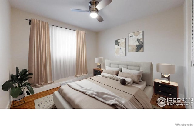 8351 Ralph Ln, Denver, CO 80221 - bedroom featuring wood finished floors, baseboards, and ceiling fan