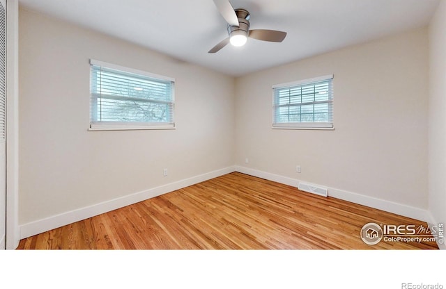 8351 Ralph Ln, Denver, CO 80221 - empty room with baseboards, light wood finished floors, and a ceiling fan