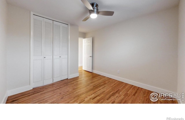 8351 Ralph Ln, Denver, CO 80221 - unfurnished bedroom with a closet, baseboards, light wood-type flooring, and a ceiling fan