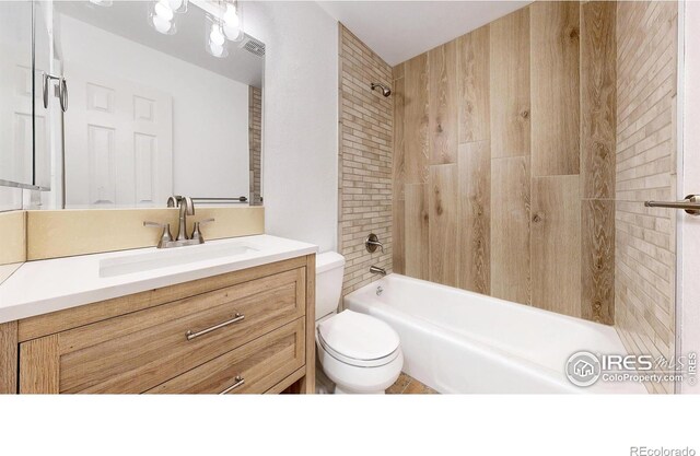8351 Ralph Ln, Denver, CO 80221 - full bath with toilet, vanity, and  shower combination