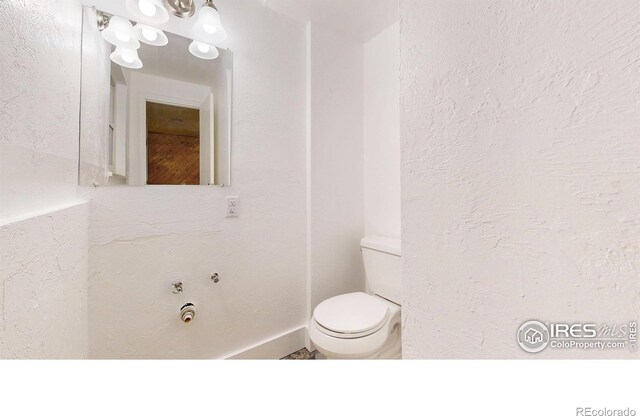 8351 Ralph Ln, Denver, CO 80221 - bathroom featuring toilet
