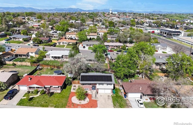 8351 Ralph Ln, Denver, CO 80221 - aerial perspective of suburban area featuring a mountainous background