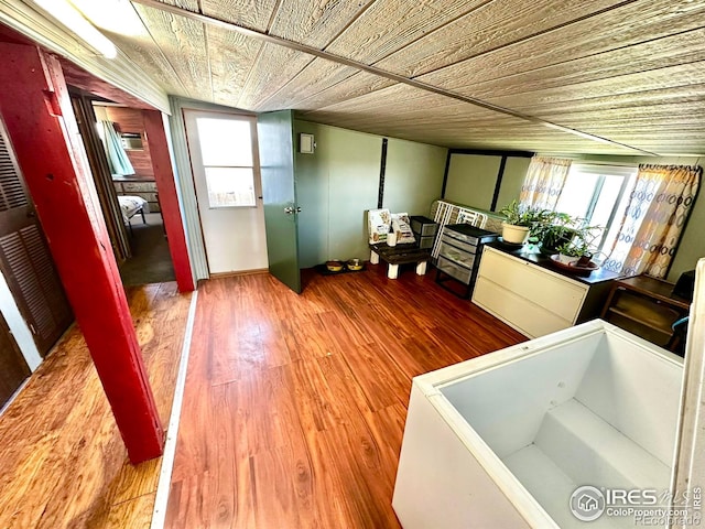 45908 County Road 39, Otis, CO 80743 - misc room with healthy amount of natural light, wood finished floors, and wooden ceiling