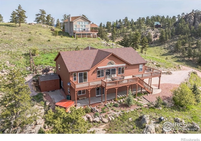 117 Mount Sherman Ct, Livermore, CO 80536 - rear view of property featuring a wooden deck and stairs