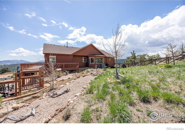 117 Mount Sherman Ct, Livermore, CO 80536 - rear view of property featuring a deck with mountain view