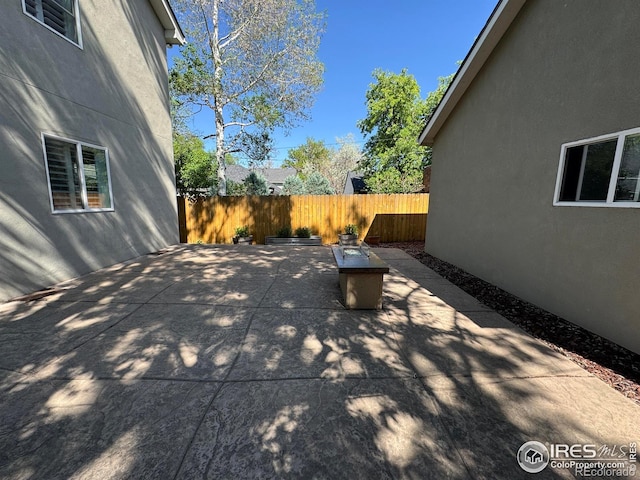 view of patio / terrace with fence