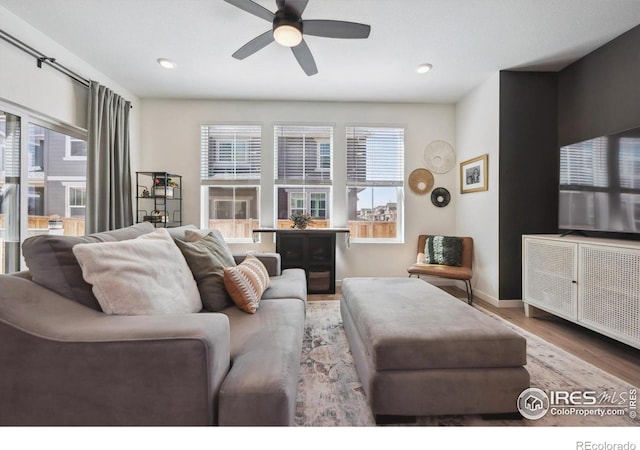 700 Lillibrook Pl, Erie, CO 80026 - living room with ceiling fan, wood finished floors, baseboards, and recessed lighting