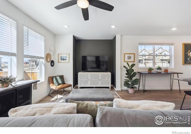 700 Lillibrook Pl, Erie, CO 80026 - living room with ceiling fan, baseboards, recessed lighting, and wood finished floors