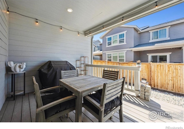 700 Lillibrook Pl, Erie, CO 80026 - wooden deck featuring area for grilling, fence, and outdoor dining space