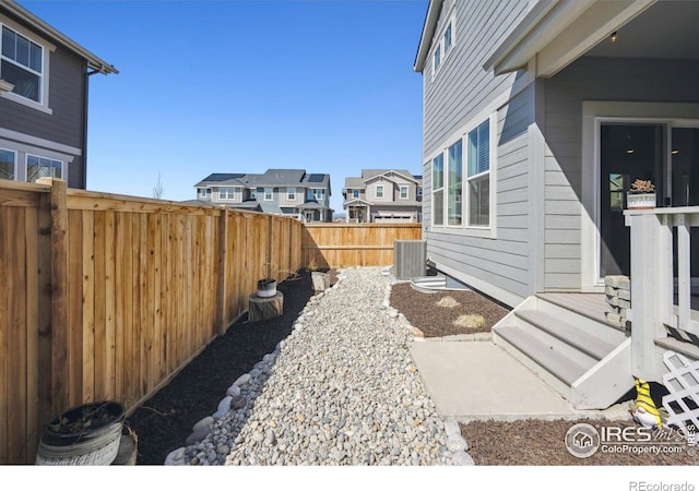 700 Lillibrook Pl, Erie, CO 80026 - fenced backyard featuring a residential view and cooling unit