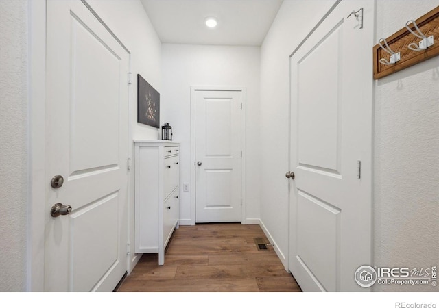 700 Lillibrook Pl, Erie, CO 80026 - hall featuring wood finished floors and recessed lighting