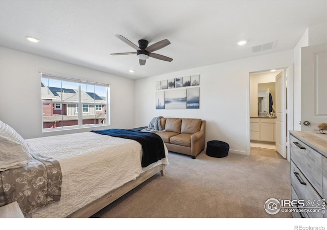 700 Lillibrook Pl, Erie, CO 80026 - bedroom with light carpet, recessed lighting, ceiling fan, baseboards, and ensuite bathroom