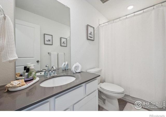 700 Lillibrook Pl, Erie, CO 80026 - bathroom with vanity, toilet, and a shower with curtain