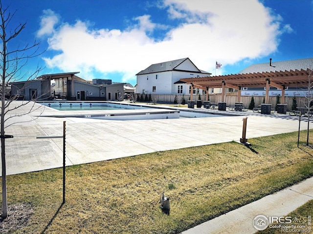 700 Lillibrook Pl, Erie, CO 80026 - community pool with a pergola, fence, and a patio