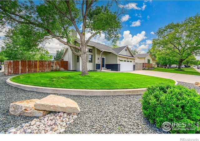 view of front facade with an attached garage and driveway