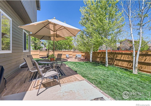 6601 Viburnum St, Wellington, CO 80549 - view of yard featuring a deck and outdoor dining space