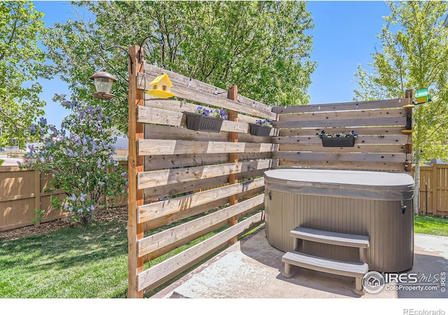 6601 Viburnum St, Wellington, CO 80549 - exterior view of a hot tub and fence