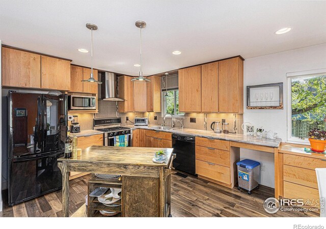 2310 44th Ave, Greeley, CO 80634 - kitchen with black appliances, wall chimney exhaust hood, a sink, dark wood-type flooring, and recessed lighting