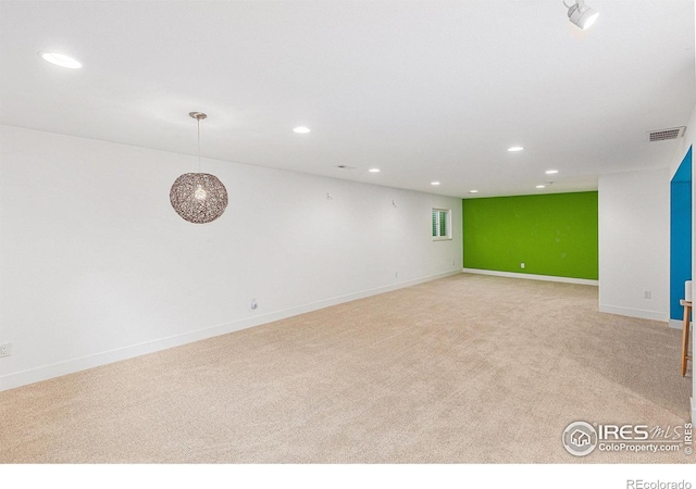 2310 44th Ave, Greeley, CO 80634 - basement featuring recessed lighting, carpet floors, and baseboards