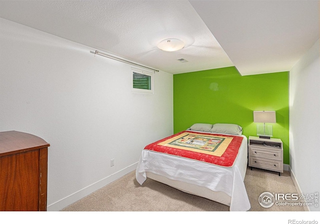 2310 44th Ave, Greeley, CO 80634 - bedroom with carpet and baseboards