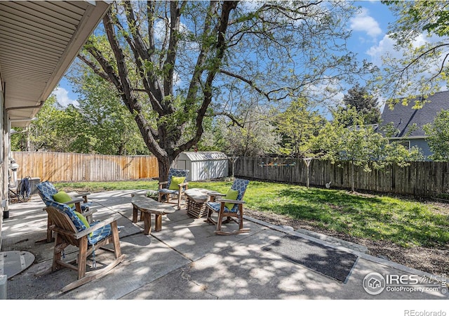 2310 44th Ave, Greeley, CO 80634 - view of patio / terrace featuring a shed and an outbuilding