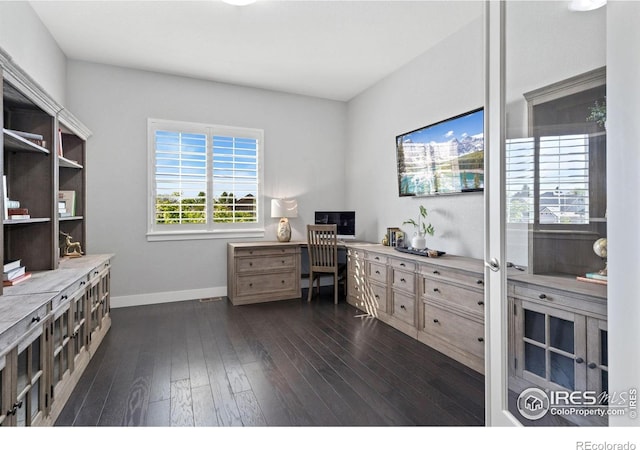 4843 Mariana Hills Cir, Loveland, CO 80537 - home office with baseboards and dark wood-style floors