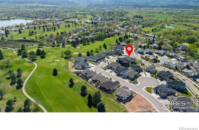 4843 Mariana Hills Cir, Loveland, CO 80537 - aerial perspective of suburban area featuring a large body of water and a golf club