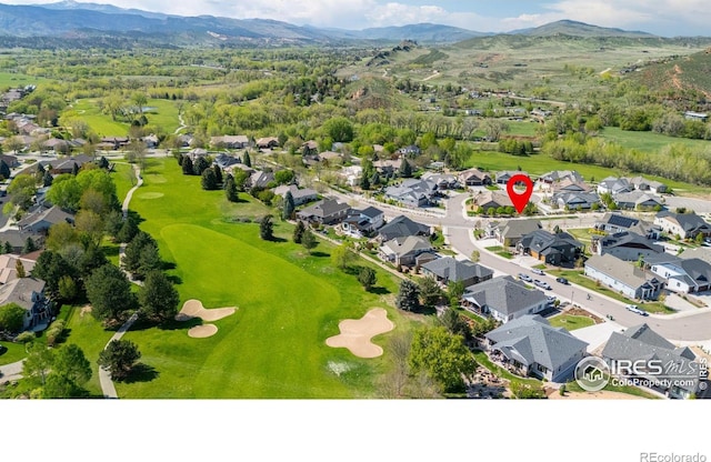 4843 Mariana Hills Cir, Loveland, CO 80537 - aerial view of residential area with a mountain backdrop and a golf club