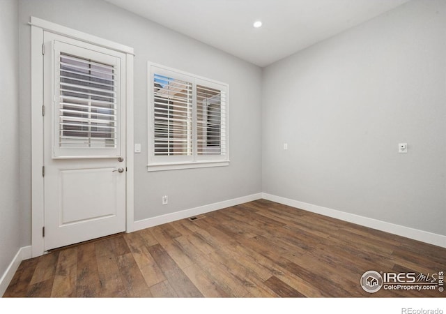 4843 Mariana Hills Cir, Loveland, CO 80537 - spare room with hardwood / wood-style flooring, baseboards, and recessed lighting