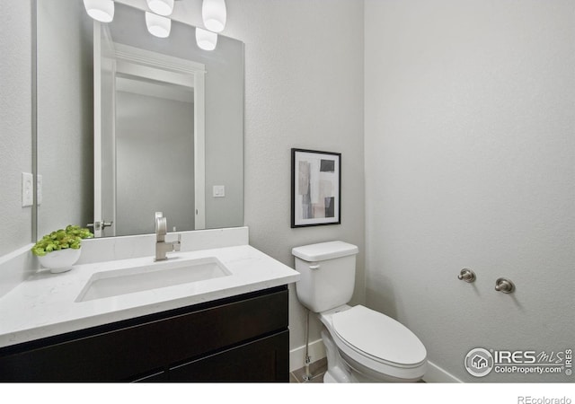 4843 Mariana Hills Cir, Loveland, CO 80537 - half bath with toilet, vanity, and baseboards