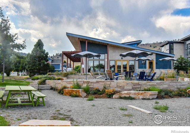 back of house featuring a patio