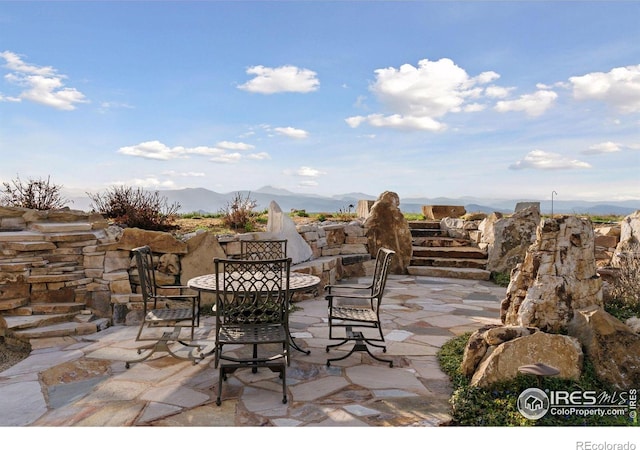 view of patio featuring a mountain view