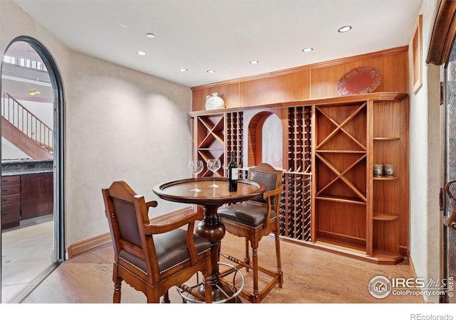 wine cellar featuring recessed lighting and baseboards