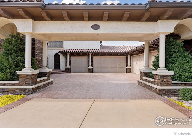 view of patio with decorative driveway