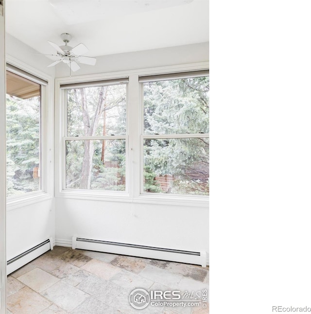 910 Kalmia Ave, Boulder, CO 80304 - unfurnished sunroom with a baseboard radiator and healthy amount of natural light